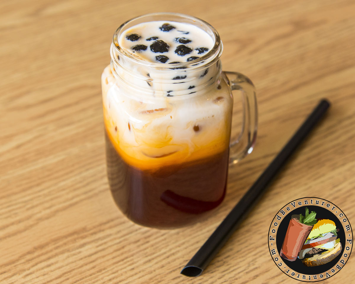 Thai iced tea with bubbles in a jar